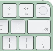 Magic Keyboard, pravý horní roh, zelená barva, Touch ID, klávesa Delete a funkční klávesy na ovládání hlasitosti