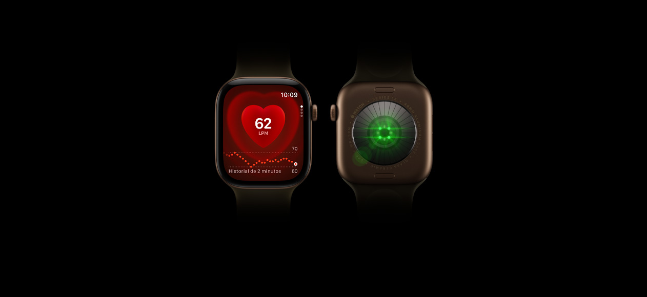 Dos dispositivos Apple Watch Series 12, caja de aluminio, color bronce oscuro, correa deportiva color oliva, uno muestra la parte frontal del reloj con la app Frecuencia Cardiaca, el otro muestra la parte posterior del reloj con el sistema de registro de datos de salud con luces LED verdes