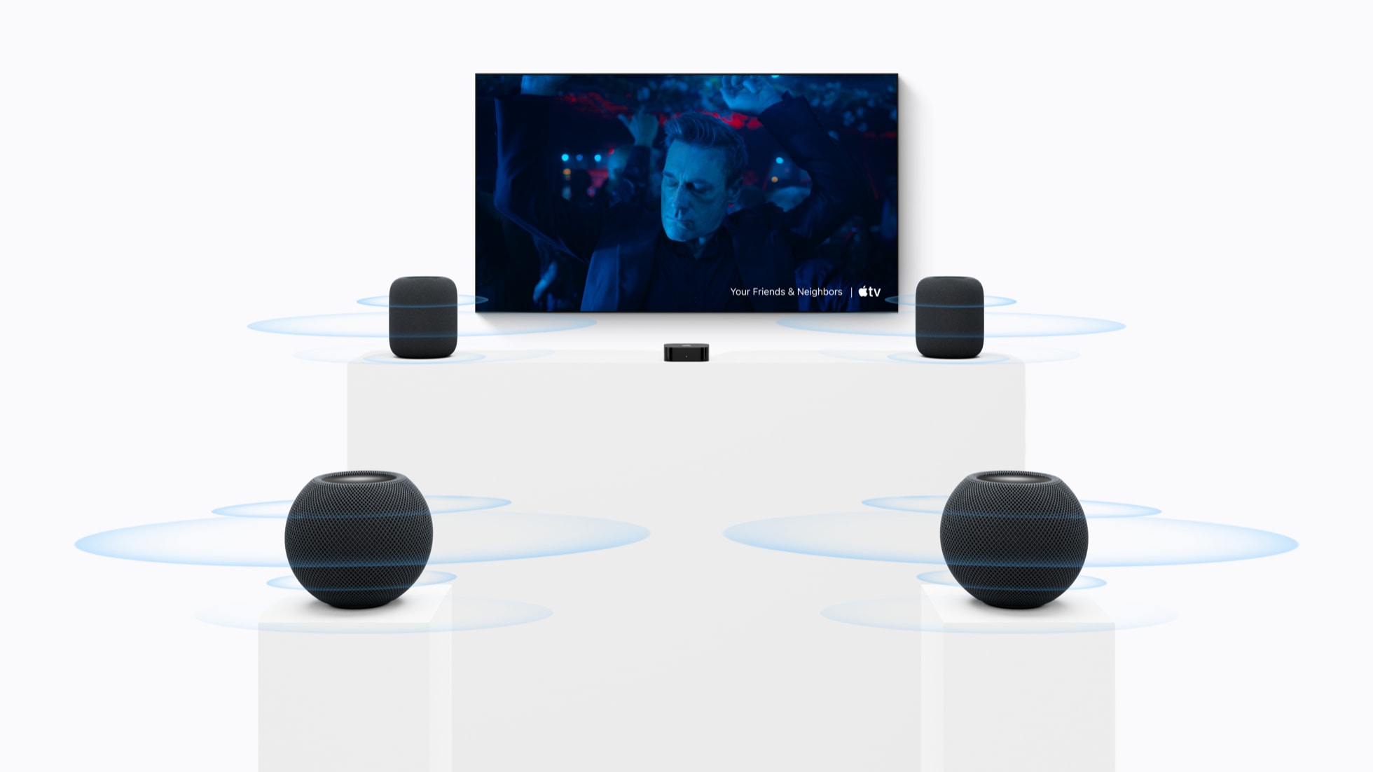 A home theater setup with two HomePod (2nd generation) speakers in the front and two HomePod mini 2 speakers in the rear.