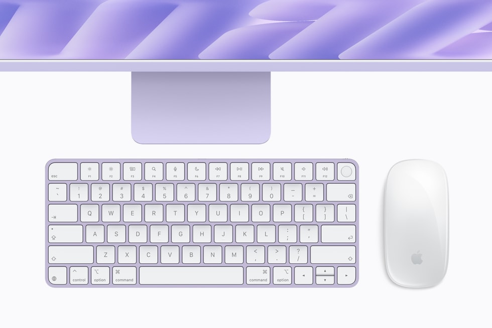 A color-matched keyboard and mouse sit below iMac with M6 in purple.