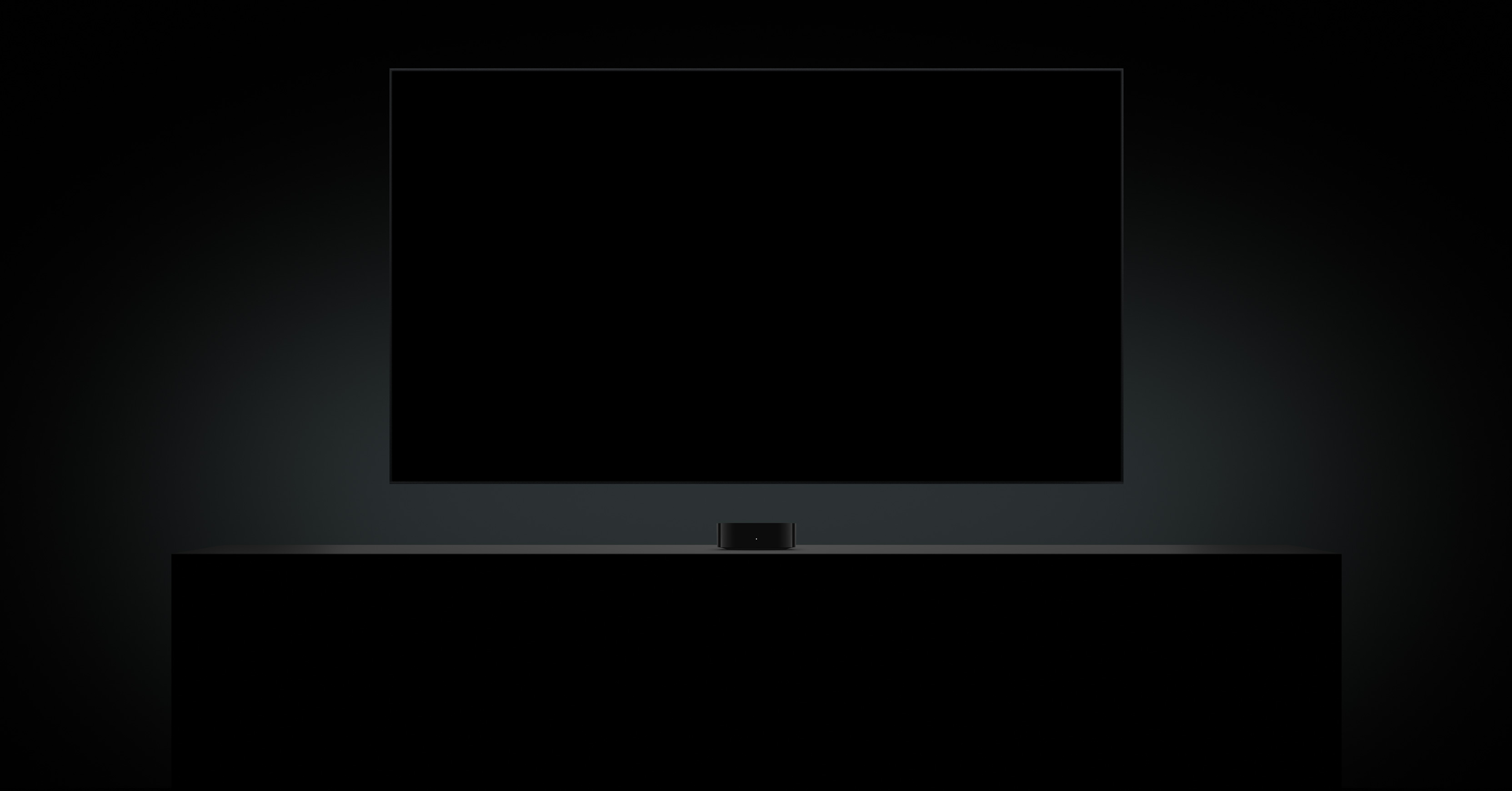 Apple TV 4K อยู่ใต้หน้าจอทีวี, หน้าจอแสดงภาพระยะใกล้ของดวงตาเรืองแสง, บรรยากาศในห้องมืด