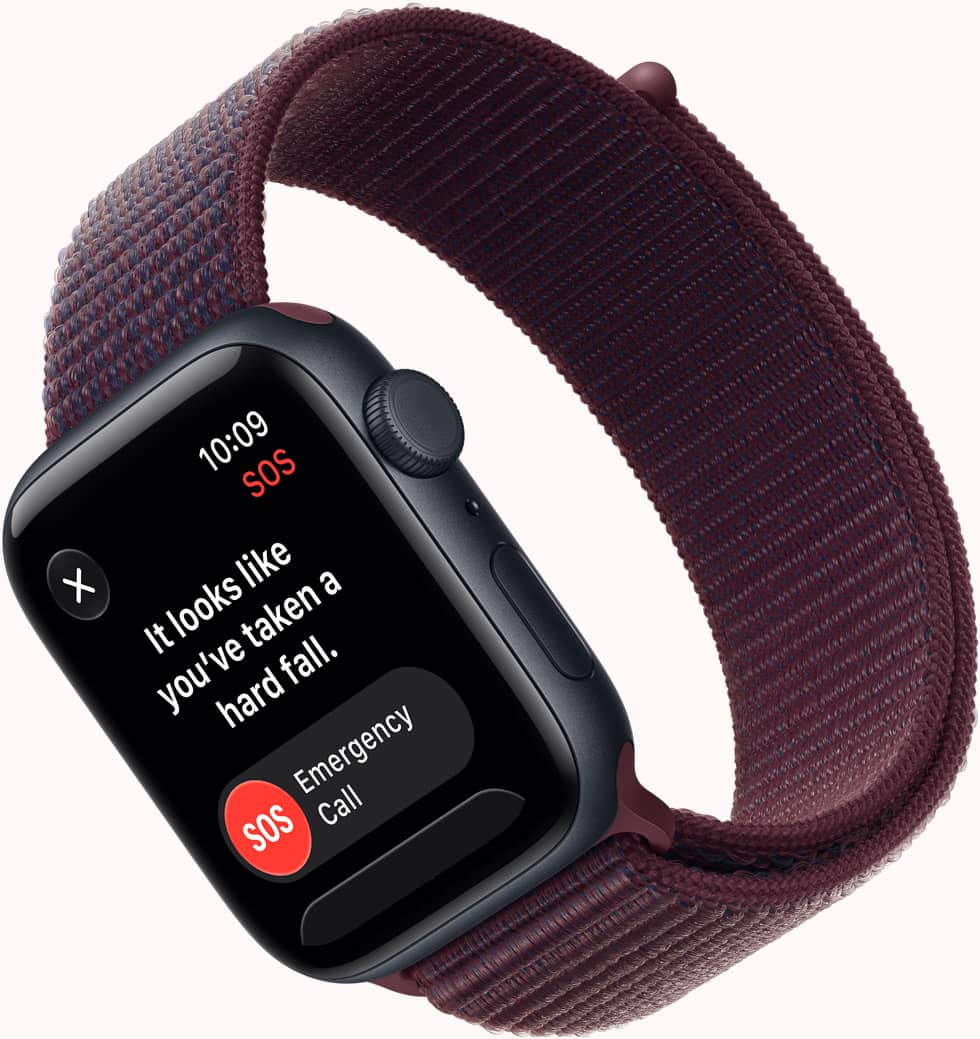 Apple Watch SE 3, screen shows SOS Fall Detection notification, emergency call button, aluminium case, midnight colour, connected to Sport Loop strap, burgundy colour
