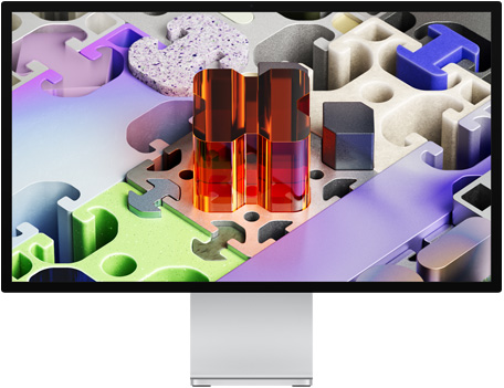 Widok z przodu na monitor Studio Display XDR z wyświetloną tapetą przypominającą puzzle