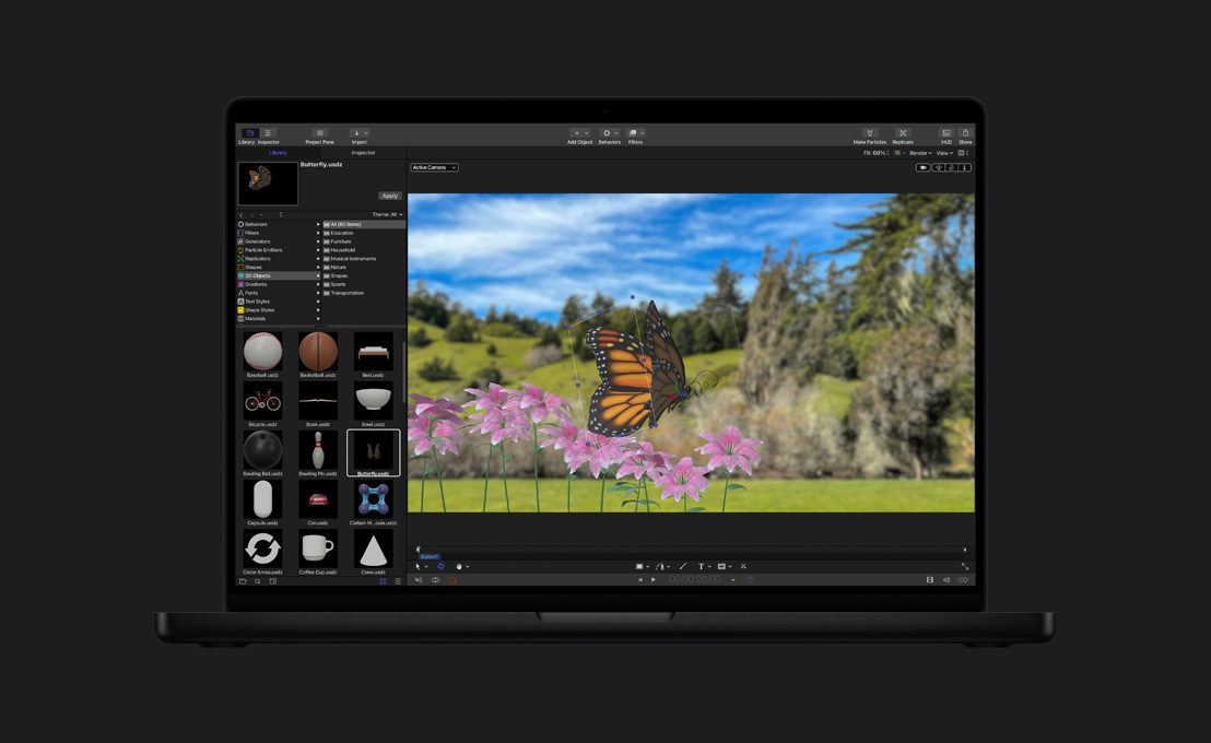 Ein 16 Zoll MacBook Pro zeigt einen Monarchfalter in der Natur