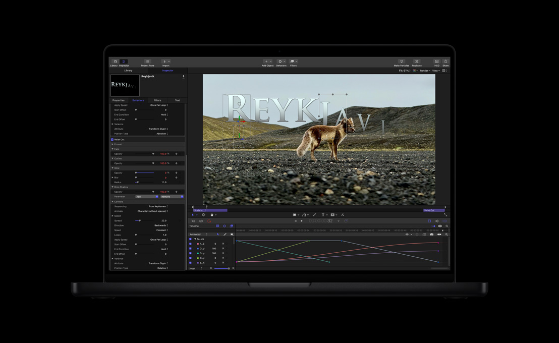 Ein 16 Zoll MacBook Pro zeigt einen Wolf in einer kargen Landschaft und die Demonstration einer Textanimation