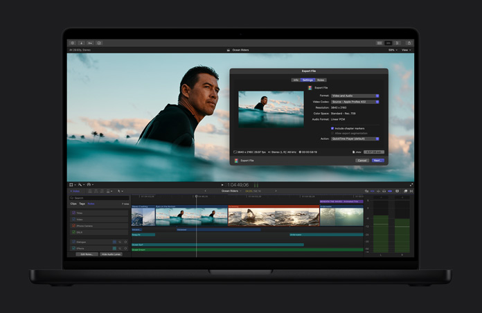 16 Zoll MacBook Pro Bildschirm mit dem Bild eines Surfers im Meer, der auf eine Welle wartet, ein Fenster zum Exportieren einer Datei ist geöffnet, Videoclip Timeline am unteren Bildschirmrand