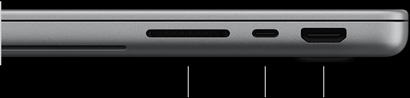 配備 PROLED XDR 顯示器的銀色 MacBook Pro，呈合上狀態；右側機身，展示三個連接埠：SDXC、Thunderbolt 5 和 HDMI