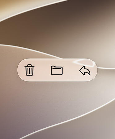 Les boutons de fonction de l’app Mail Supprimer, Déplacer et Répondre sur un fond or tourbillonnant, avec un contraste élevé qui les rend très lisibles